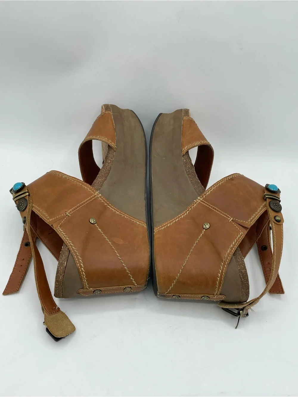 OTBT Layover Brown Leather Wedge Sandals with Turquoise and Metal Stone Accents.
